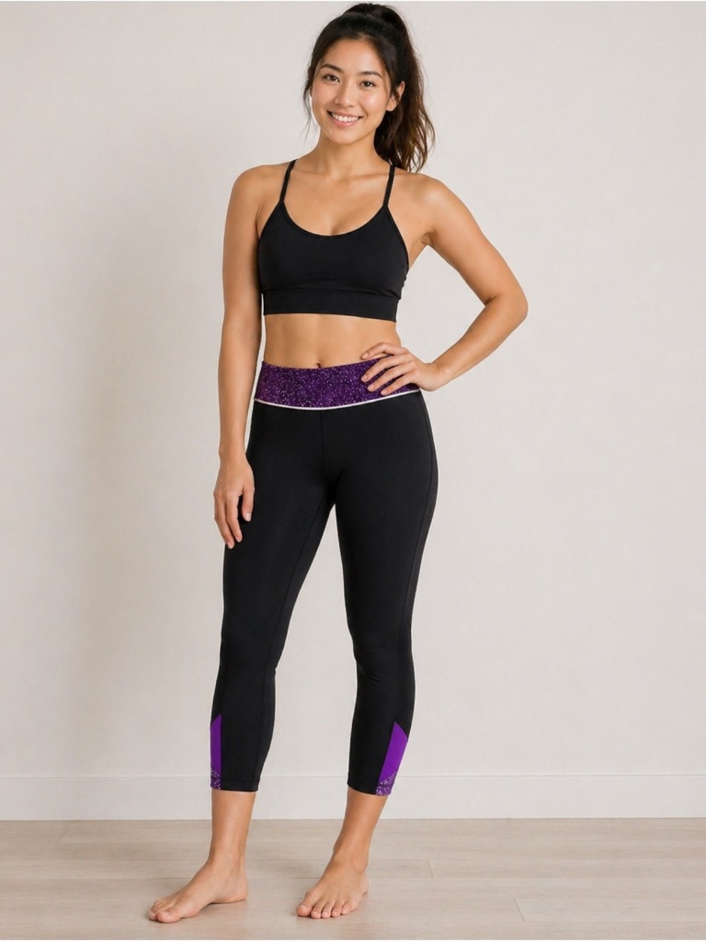 Lululemon Women's Black Crop Athletic Leggings with Purple Accents